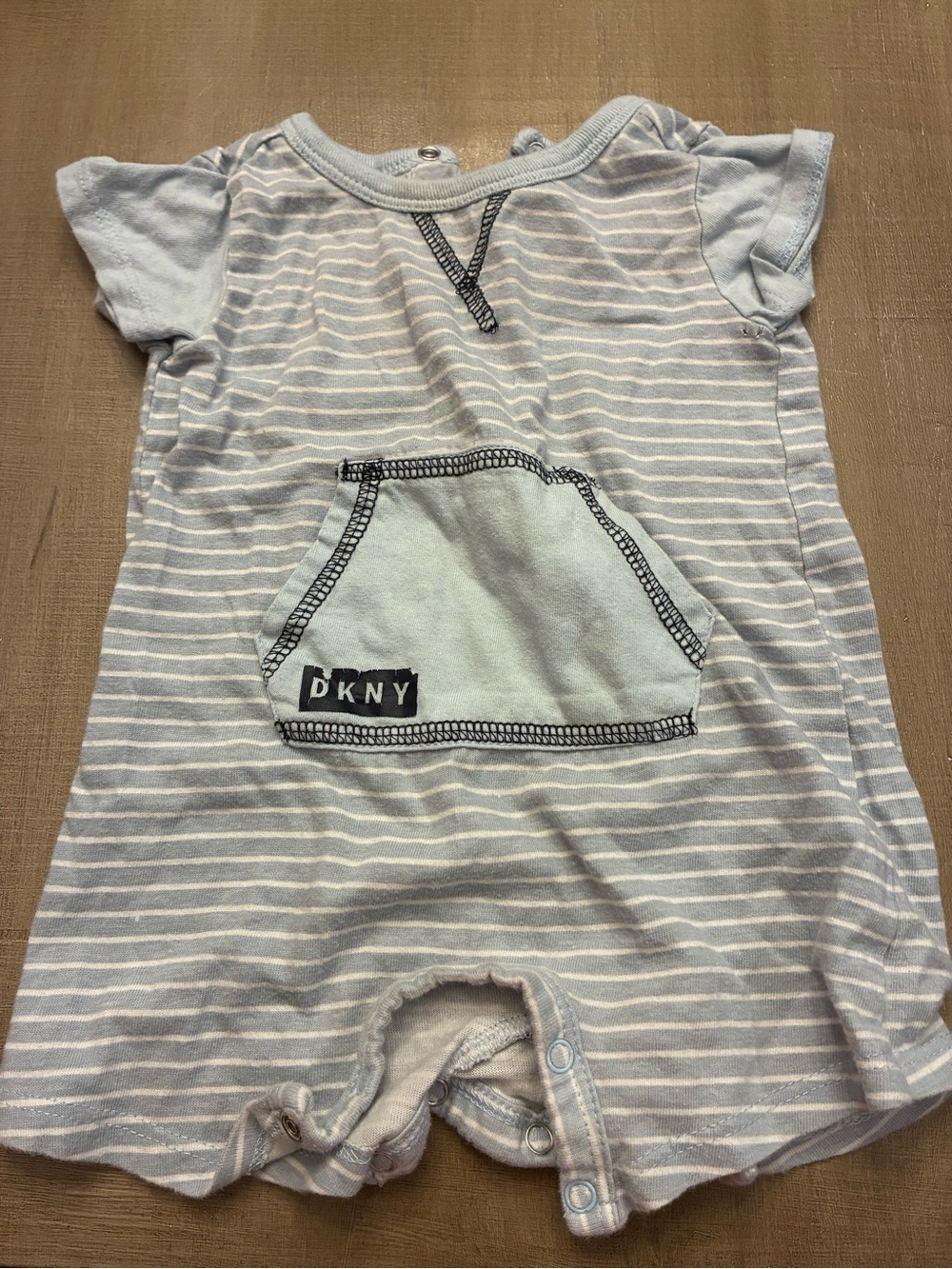 DKNY Light Blue and White Striped Baby One-Piece with Front Pocket